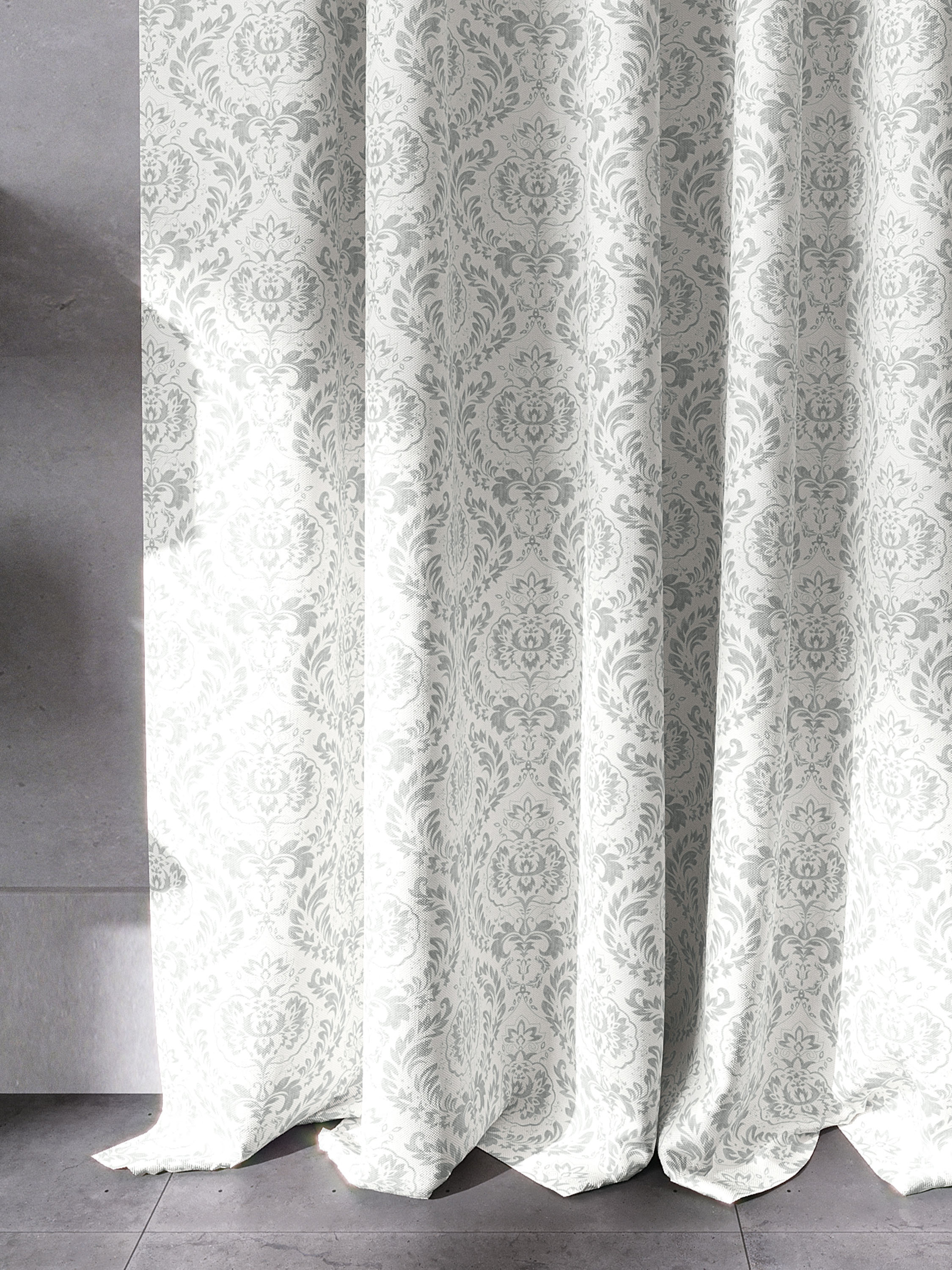 A classic damask pattern is printed on a textured semi-sheer fabric curtain